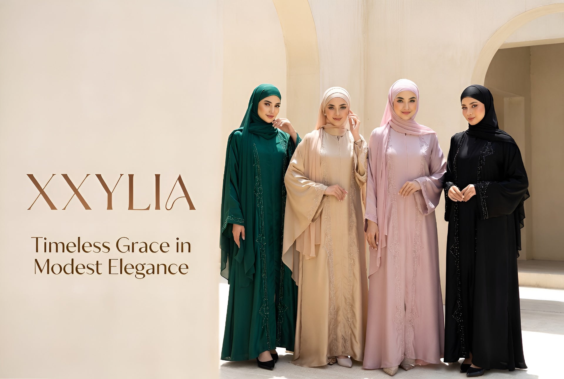 Four women in abayas standing together with 'XXYLIA' branding and tagline.