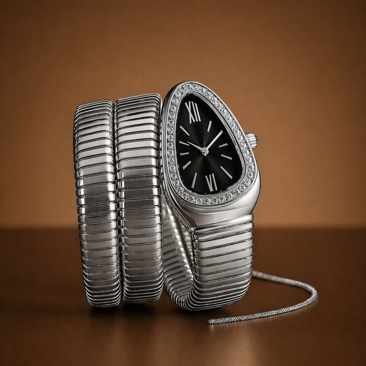 Silver watch with ribbed band on a brown background