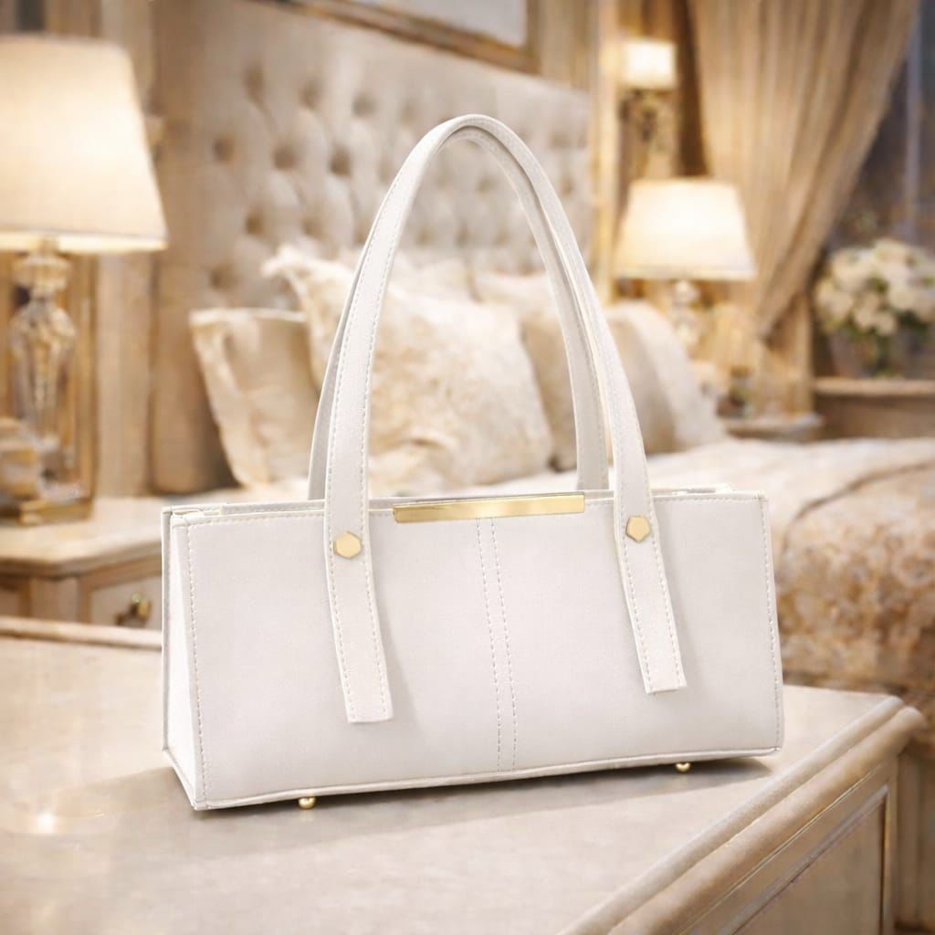White handbag on a table with a luxurious room background