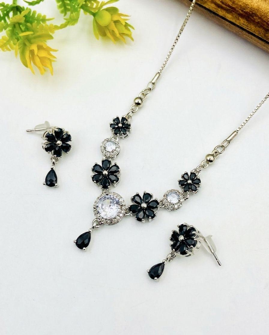 Jewelry set with necklace and earrings on a white background