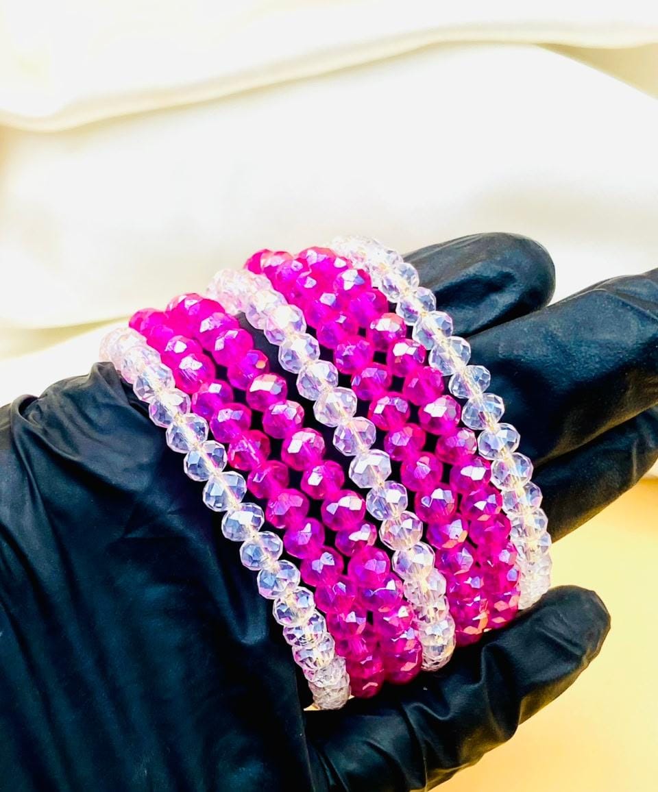 Elegant 7-piece pink and clear crystal bracelet set for women featuring sparkling faceted beads, perfect for parties, weddings, gifting, and everyday fashion.