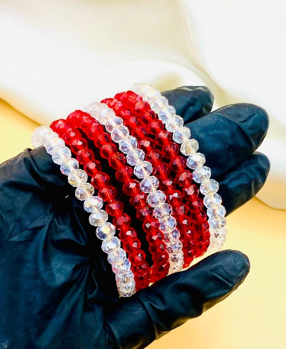 Elegant 7-piece red and clear crystal bracelet set for women featuring sparkling faceted beads, perfect for parties, weddings, gifting, and everyday fashion.