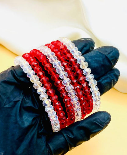 Elegant 7-piece red and clear crystal bracelet set for women featuring sparkling faceted beads, perfect for parties, weddings, gifting, and everyday fashion.